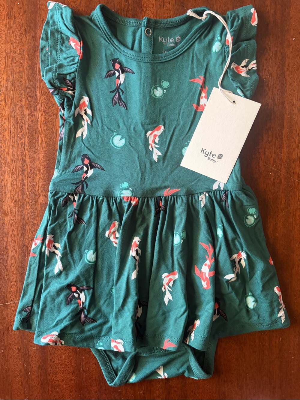 Kyte BABY Green Koi Print Ruffle Bodysuit